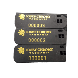 Example image of gold hot foil marking on a black seal